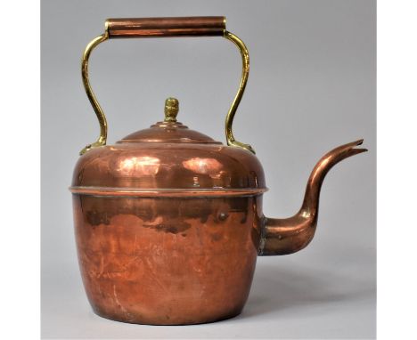 A Large Copper Kettle with Brass Finial, 30.5cm high 