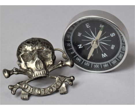 A Small Pocket Compass and a Reproduction 17/21st Lancers Cap Badge 