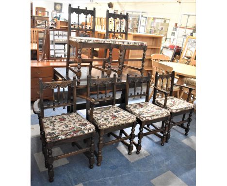 A Mid 20th Century Oak Ercol Dining Table and Six Chairs 