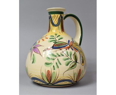 A German Ceramic Jug Decorated with Flowers and Bird, 25.5cm high 