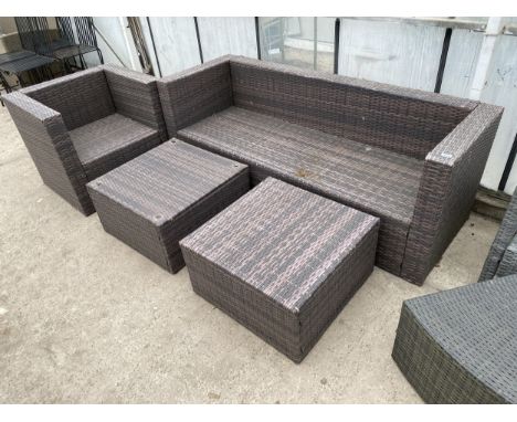 A RATTAN GARDEN FURNITURE SET COMPRISING OF A BENCH, A CHAIR AND TWO STOOLS