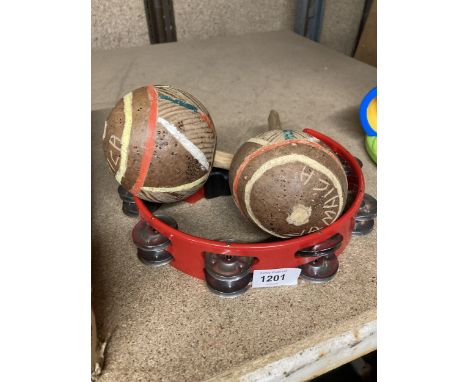 A PAIR OF VINTAGE MARACAS AND A PROFESSIONAL TAMBOURINE