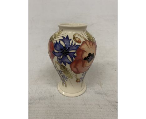 A MOORCROFT 6 INCH PAIX POPPY VASE BY EMMA BOSSONS