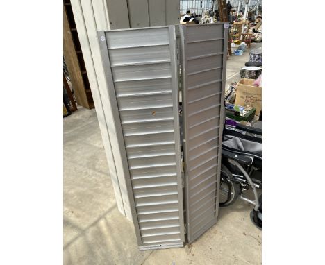 AN ALUMINIUM FOLDING WHEELCHAIR RAMP