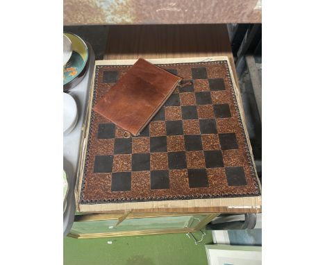A HEAVY RESIN CHESSBOARD