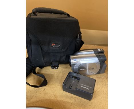 A PANASONIC VDR-D160 CAMCORDER WITH CHARGER AND CASE