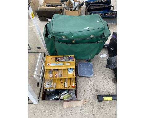 A FISHING TACKLE BAG AND AN ASSORTMENT OF FISHING TAKCLE TO INCLUDE HOOKS, LURES AND FLOATS ETC