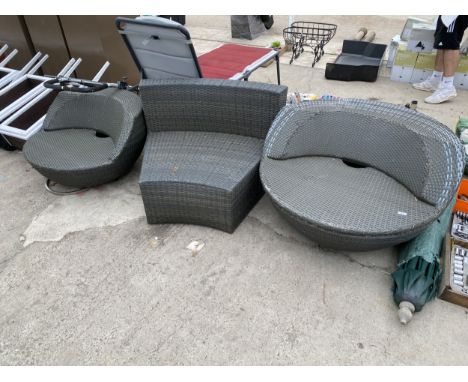 THREE ITEMS OF RATTAN GARDEN FURNITURE TO INCLUDE TWO SEATS AND A CORNER SOFA SECTION