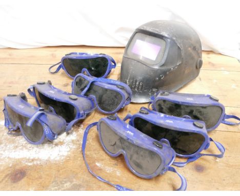 Speedglas 9100 welding helmet and 7 pairs of Arco welding goggles.