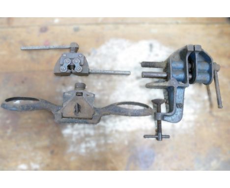 Vintage bicycle chain link extractor, vintage spoke shave and vintage Univice V6 bench vice.