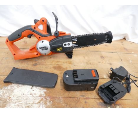 Black & Decker GKC1817 18v cordless chainsaw with battery and charger.