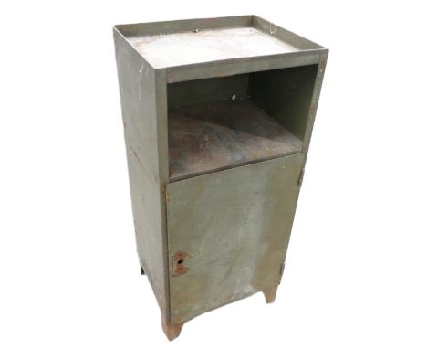 Industrial metal workshop cabinet with 2 internal shelves and shelf space under cabinet top, raised on legs, measuring 46cm w