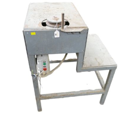 Industrial table grinder.