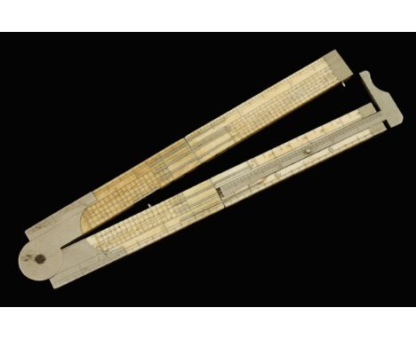 A rare 12" four fold ironmongers ivory rule with German silver caliper with numerous scales G++