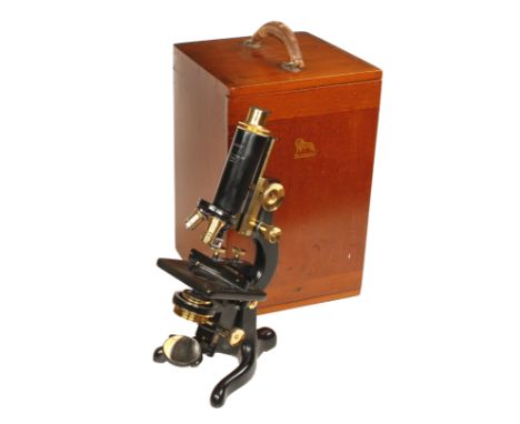 A little used black enamel and lacquered 1936 WATSON'S Universal monocular microscope,Service model with rack and pinion adju