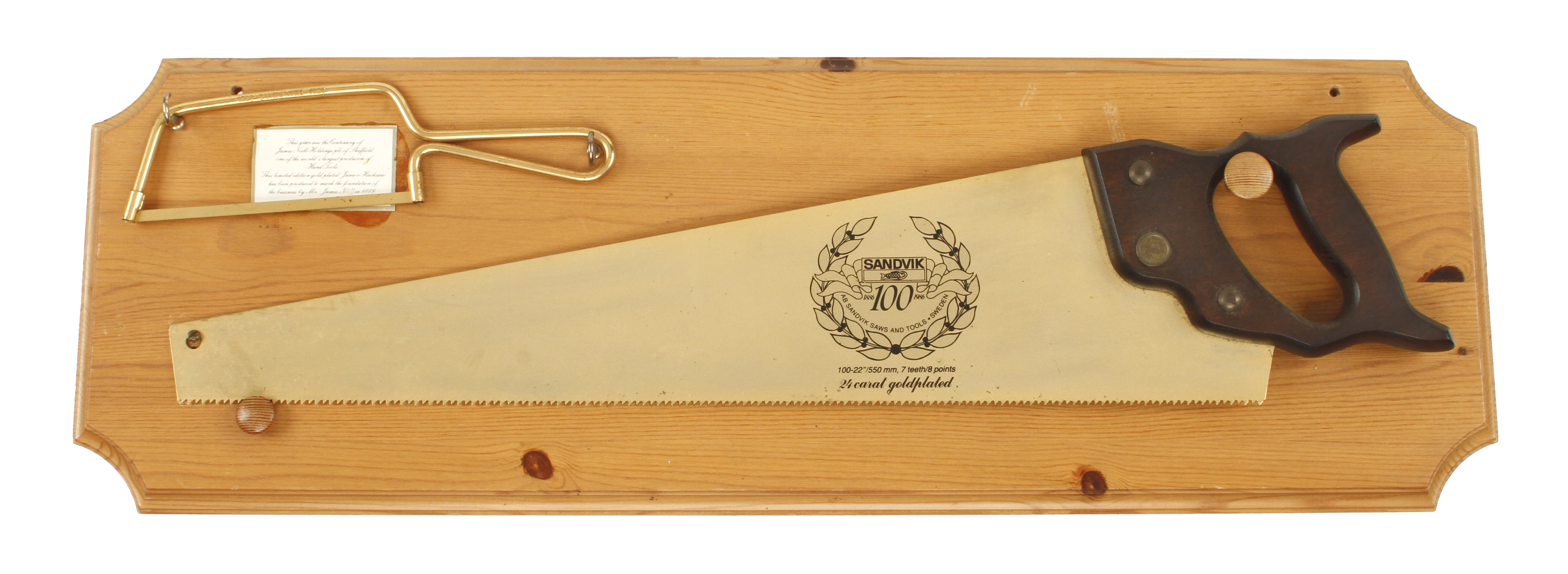 A SANDVIK No 100 24 carat goldplated 22" shop display hand saw with