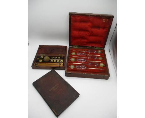Two Cased Sikes Hydrometers and Hydrometer Tables