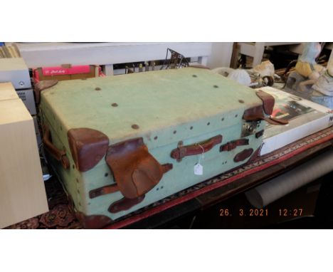 A leather bound cabin trunk