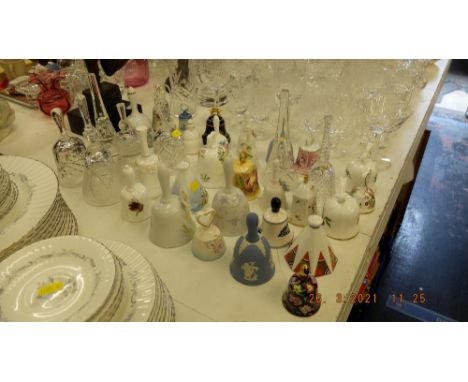 A qty of assorted bells inc. Poole, Royal Worcester etc. 35 pieces