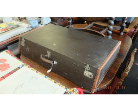 An early car boot trunk, leather bound