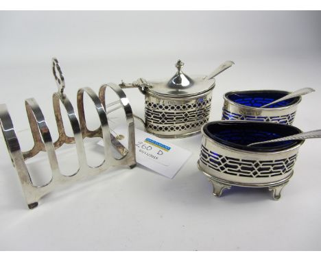 Victorian/Edwardian matched three piece cruet with blue glass liners by Haseler Brothers Chester, three spoons and a  four di