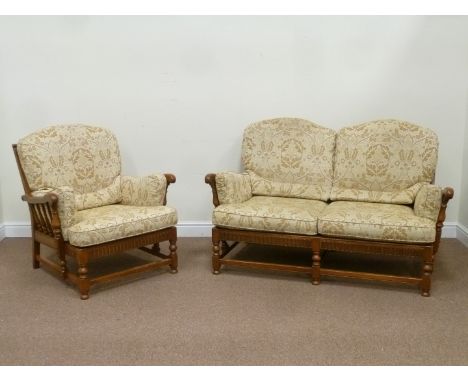 Ercol 'York Minster' golden elm two seat sofa (W154cm), and matching armchair (W88cm)