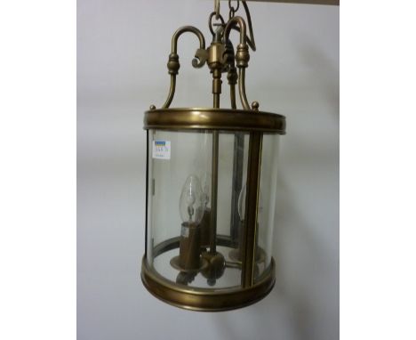 Bronzed finish hall lantern H36cm excluding length of chain and a mirror H56cm 