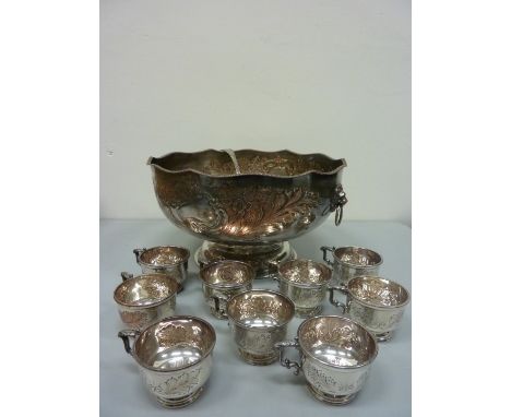 Silver plate on copper punch bowl with lion's mask handle H21cm, nine matching cups, ladle and other silver plate in one box 