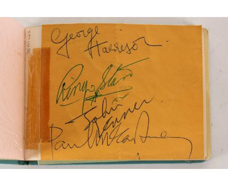 The Beatles: an early 1960s autograph book, containing a tipped-in page featuring the signatures of George Harrison, Ringo St