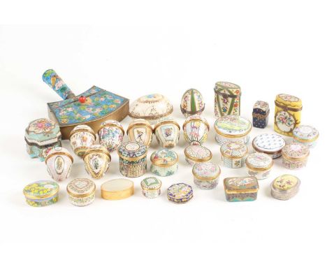 A small collection of decorative porcelain and enamel ovate and other etui and boxes including Halcyon Days. 