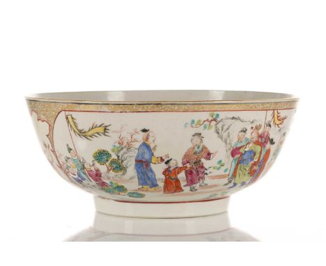 A Chinese famille rose bowl, Qing, late 18th century, the interior painted with Budai and a young boy, the exterior with pane