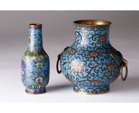 For the scholars desk, a Chinese cloisonne enamel vase for censer tools, Qing, 18th/19th century, of bottle form, the neck wi