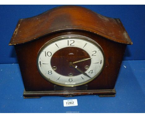A Smiths Tempora Mantle Clock with Westminster chimes, pendulum and key present, presentation plaque to the front.