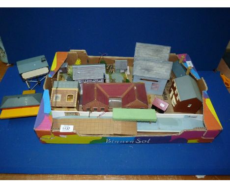 A box of 'OO' gauge model Railway buildings, some with 12v electric lighting.
