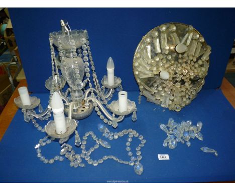 A five branch Electrolier with glass droppers and a mirror backed ceiling light with droppers