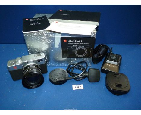 A Leica Digilux 2 Digital Camera having a Leica DC Vario-Summicron 7-22.5mm (28-90mm equiv) f/2-2.4 Zoom Lens, boxed with bat