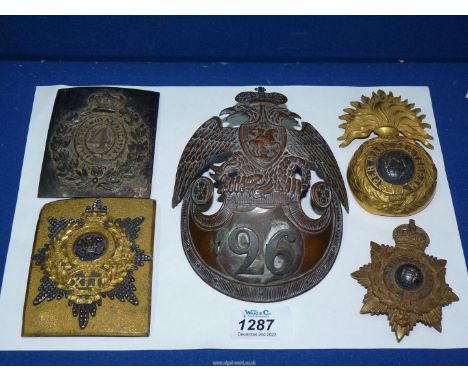 A 26th Infantry Regiment Russian Army helmet plate with the double eagle with a shield in relief portraying St. George slayin