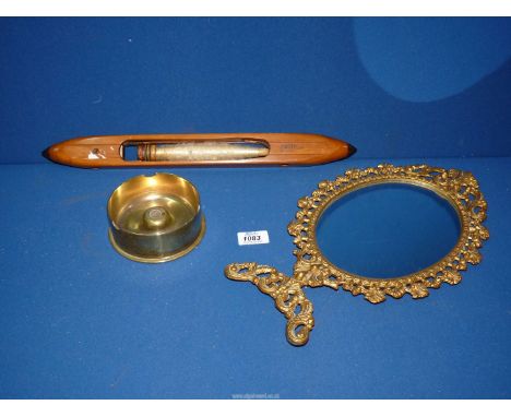 A heavy Trench Art shell base case converted to an ashtray, 4 1/2" diameter, plus an early 20th century weavers brass and woo