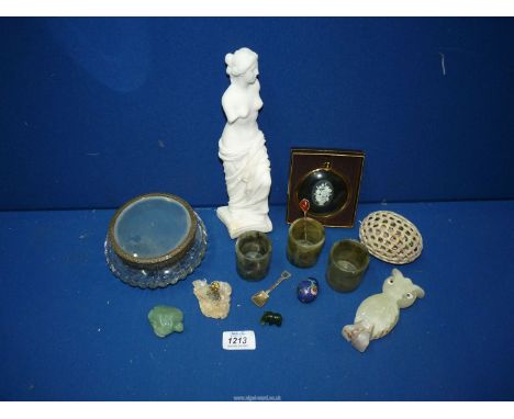 A small quantity of miscellanea including a set of three mottled green, translucent stone cups, carved soapstone egg with ele