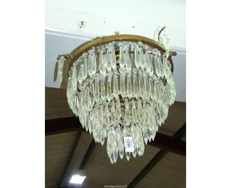 A four tier glass chandelier, 13" diameter (widest part at the top).