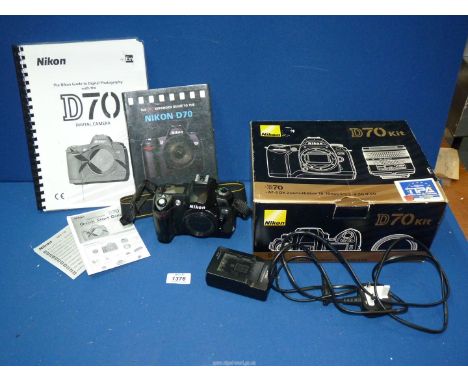 A Nikon D70 Digital SLR Camera body with battery, charger, box, Nikon guidebook and PIP guidebook, a/f.