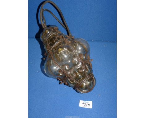 A bubble glass ceiling light with metal casing.