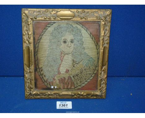 An old tapestry picture in original frame of King George, some fading, 6" x 7" excl. frame.