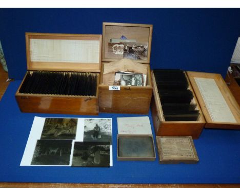 A quantity of glass negatives in two pine boxes mainly relating to family life in Stirling and Lanark, together with a pine b