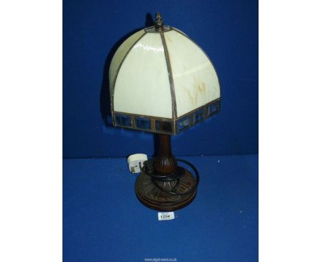 A Tiffany style lamp with plain cream shade, 19" tall.