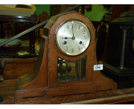 An Art Deco style mantle clock with front bevel glass panel, no key, 15 3/4" x 12" high. 