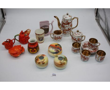 A small quantity of china including Samurai part coffee set (some damage), novelty souvenir shellfish jugs and trinket pots, 