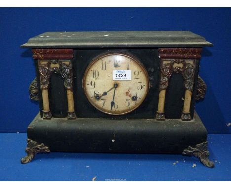 A classical style wooden mantle clock, 17'' wide x 11'' high x 5 1/2' deep.