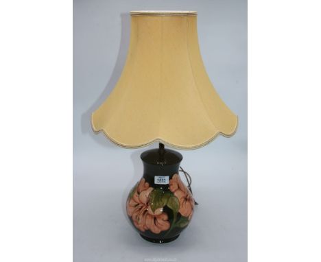 A Moorcroft lamp in Hibiscus pattern, 14 1/2" tall (excl. shade).
