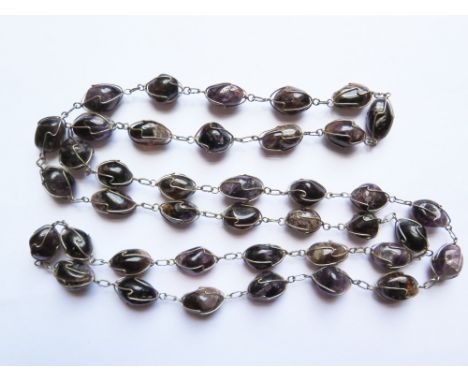 An Amethyst or Blue John Necklace 